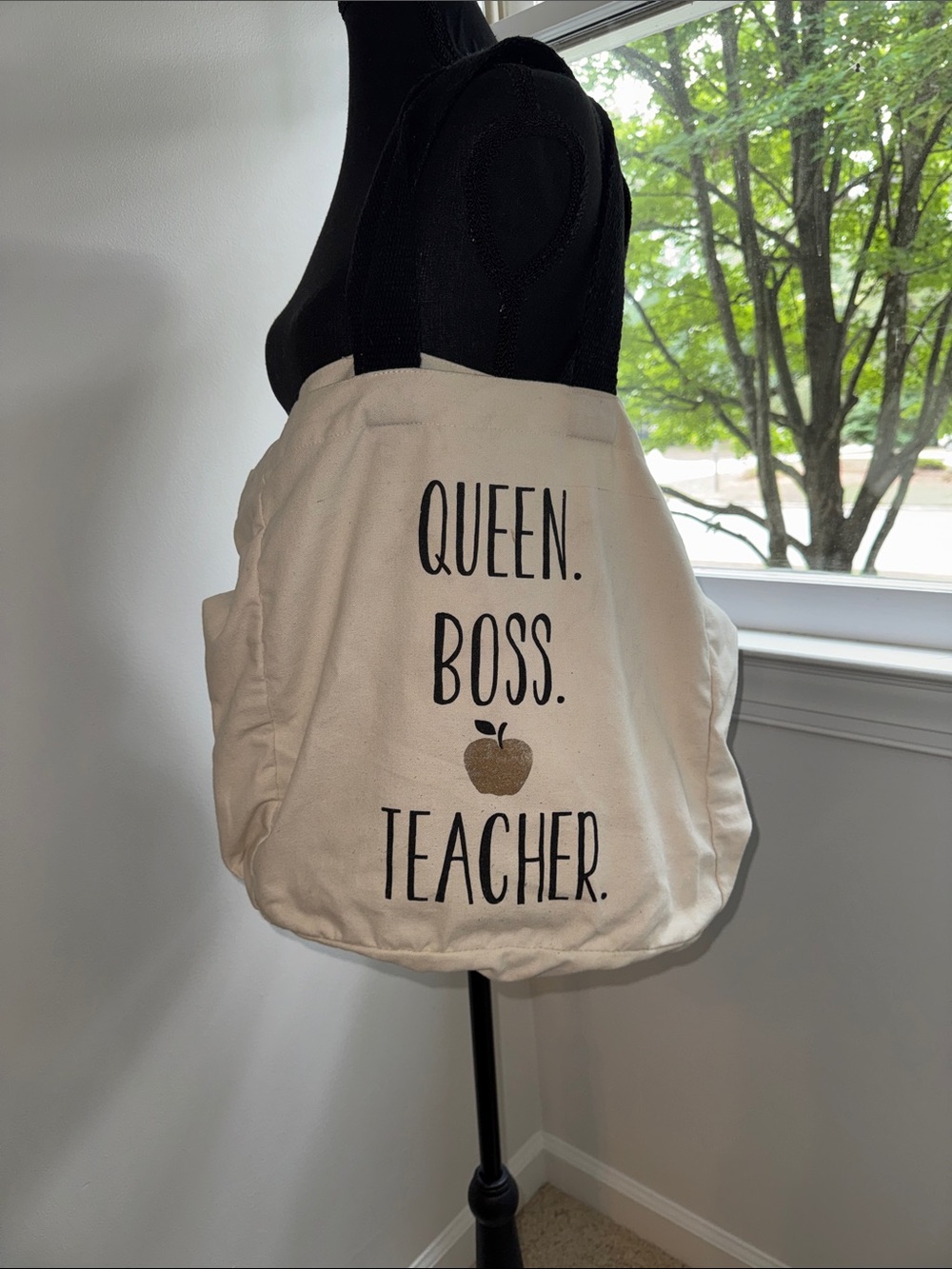 Source Unknown Two-Sided Cream Canvas Tote with Black Text and Gold Apple